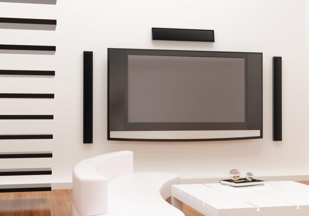 a modern living room with a flat screen tv on the wall